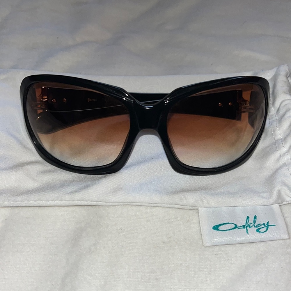 OAKLEY women’s sunglasses, in good condition